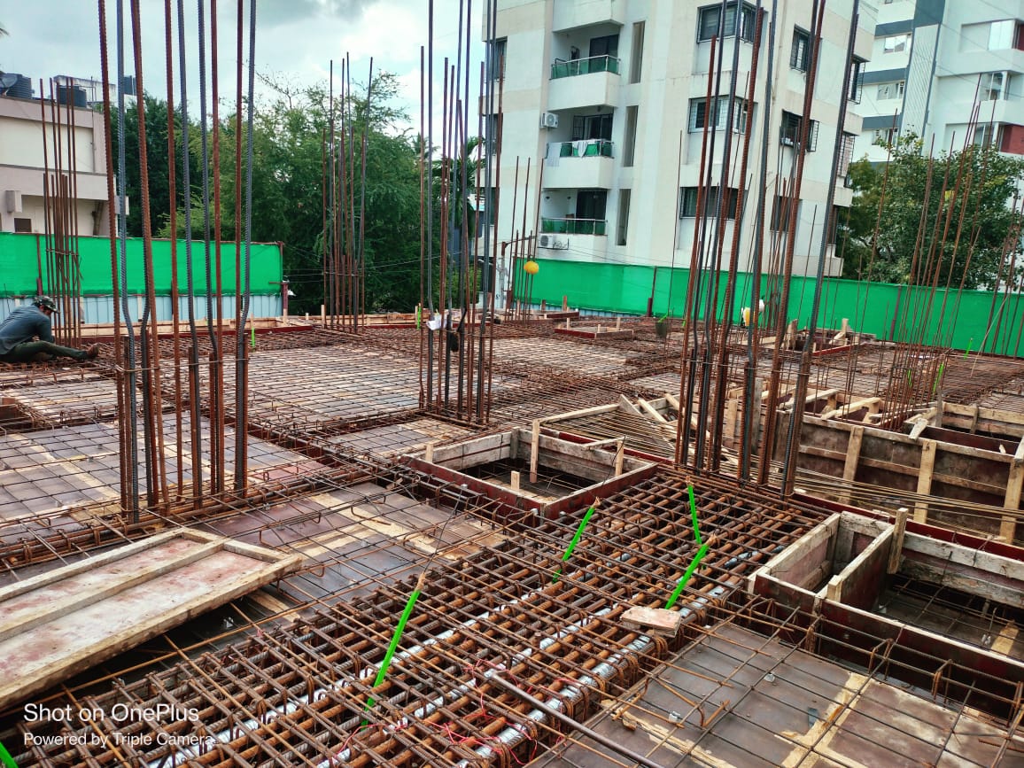 Multi-storey RCC construction site progress in PCMC